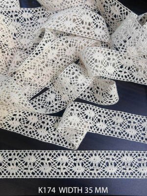 K174 greige cotton crochet dyeable lace 35 mm with repeating sunburst openwork motifs