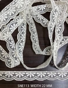 SNE113 – Net Embroidered Laces – POLY WHITE EMBROIDERY ON ORGANZA MESH NET WIDTH 22 MM PRICE PER METER EXPORT QUALITY