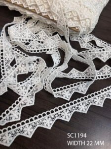 SC1194 white polyester GPO chemical lace – 22mm fine trim for boutique garments and couture accents