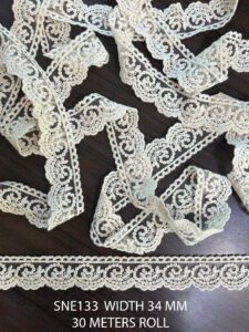 Intricately embroidered net cotton lace SNE133 with floral motifs for sarees, lehengas, and gowns