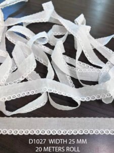 Close-up view of D1027 white floral lace trim showcasing intricate embroidery and scalloped edges