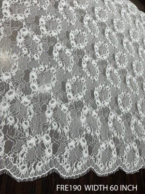 White Chantilly lace fabric with eyelash edges, 60-inch width, ideal for bridal veils and curtains