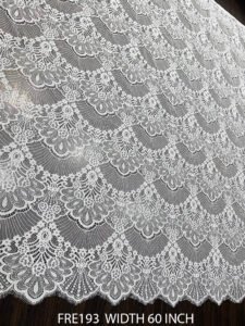 FRE193 Chantilly lace fabric with elegant floral motifs and eyelash edges, 60-inch wide, ideal for bridal and boutique garments