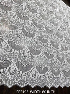 FRE193 Chantilly lace fabric with elegant floral motifs and eyelash edges, 60-inch wide, ideal for bridal and boutique garments