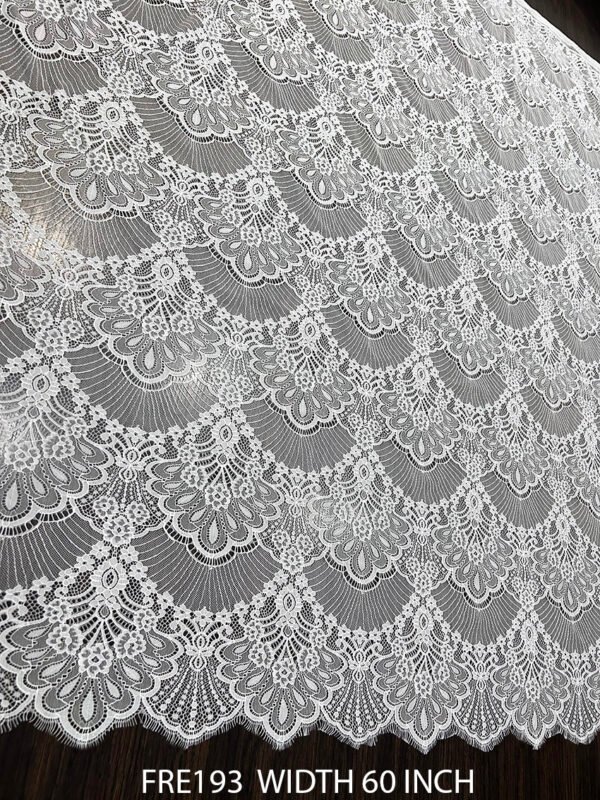 FRE193 Chantilly lace fabric with elegant floral motifs and eyelash edges, 60-inch wide, ideal for bridal and boutique garments