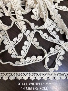 SC141 chemical lace trim in 14-meter roll – intricate white floral pattern for garments