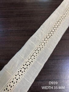 D939 cambric embroidered lace with 12mm detailing on 35mm base – dyeable export quality