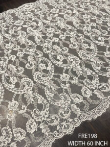 FRE198 white Chantilly eyelash lace fabric with scalloped floral design – bridal and couture ready