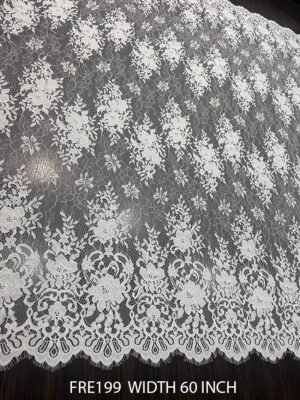 FRE199 white Chantilly eyelash lace fabric with scalloped edges and floral motifs – bridal and couture ready