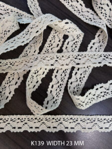 K139 cotton crochet lace in griege finish, dyeable and 23 mm wide for versatile garment applications