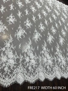 FRE217 white Chantilly bridal lace fabric with scalloped edges, 60-inch width, dyeable export quality