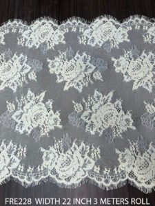 FRE228 Griege Chantilly Lace fabric roll, 22-inch width, dyeable, with both-side scallop edges.