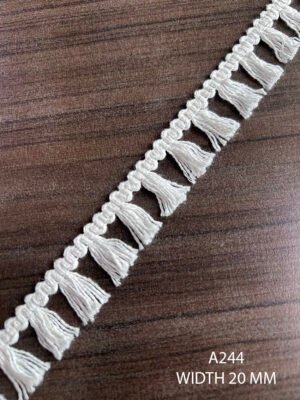 Close-up of A244 cotton white fringe lace, 20mm width, dyeable, sold per meter