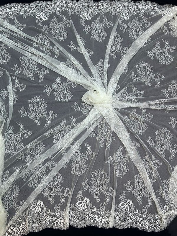 Close-up of FRE233 White Chantilly Eyelash Eyelash Lace Fabric with scallop edges, dyeable, 60 inch width, 3 meter price