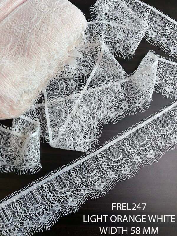 FREL247 Chantilly Fine Dyeable Elace in very light orange white, 58mm width, 3 meters