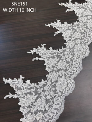 Close-up view of SNE151 luxurious 10-inch wide net embroidery bridal lace.