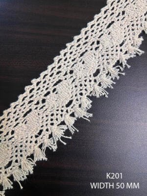 K201 greige cotton edging 50 mm with heart motifs, open mesh and hanging tassel fringe