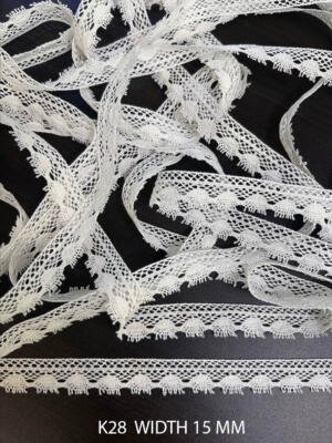 K28 15 mm white cotton edging with diamond mesh and repeating leaf drop motifs