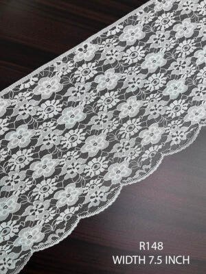 R148 7.5 inch white fine Raschel nylon soft wide lace with floral motifs and scalloped edge