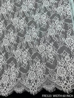 FRE323 60 inch white dyeable Chantilly eyelash lace fabric with floral pattern and scalloped edges