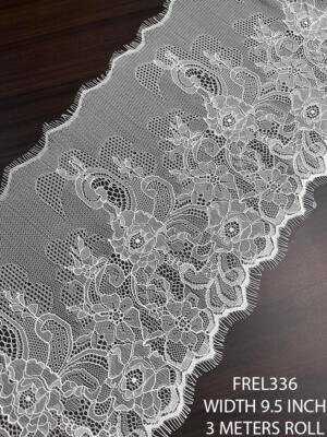 FREL336 white Chantilly eyelash lace border with ornamental scrollwork, blooming floral sprays, airy mesh netting, and dramatic scalloped eyelash edging.